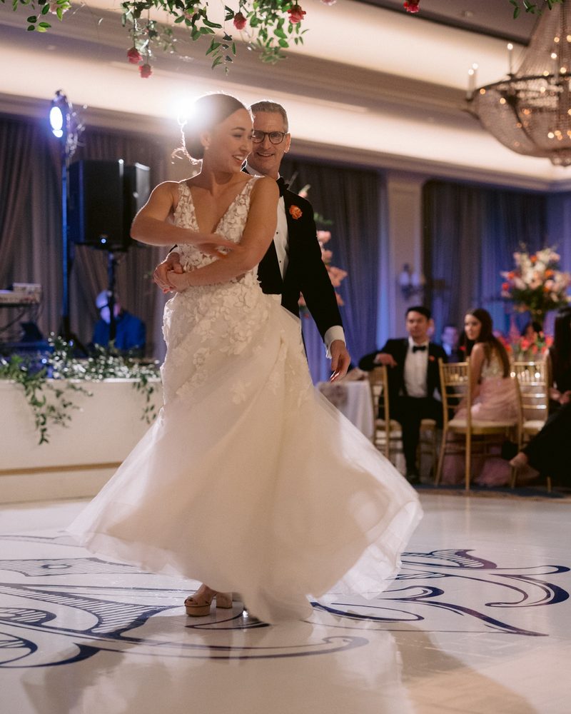 Bride and groom first dance twirl